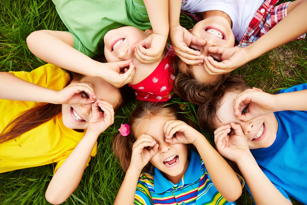 children-playing-on-grass