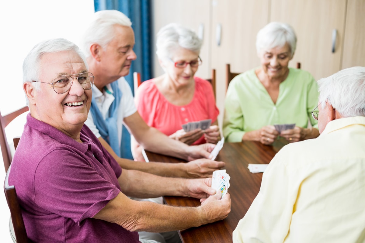 seniors-playing-cards-together